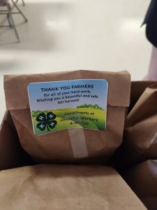 Cheerful Workers 4-H Club Ignite Sparks by Delivering Local  Farmers Sack Lunches!