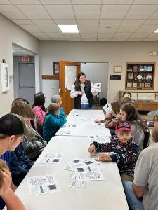 Abby George, an adult leader and 4-H alum, shares her expertise in photography at the Hilltop Climbers 4-H Clubs November meeting