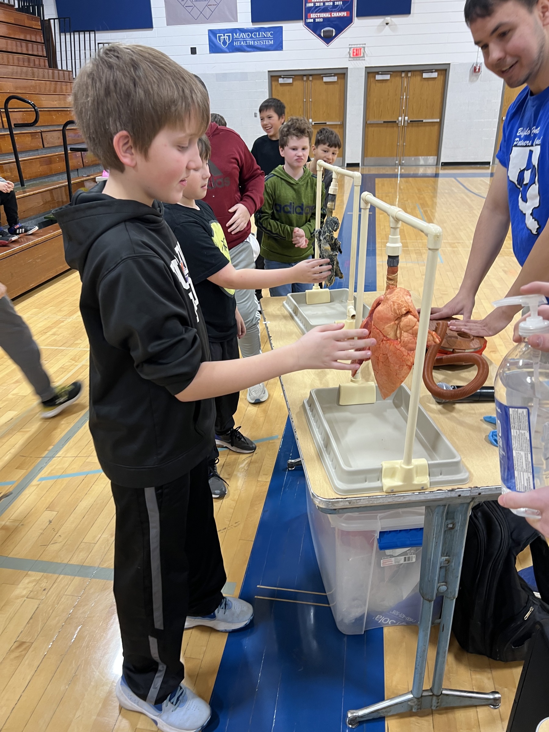 Students with the lung display