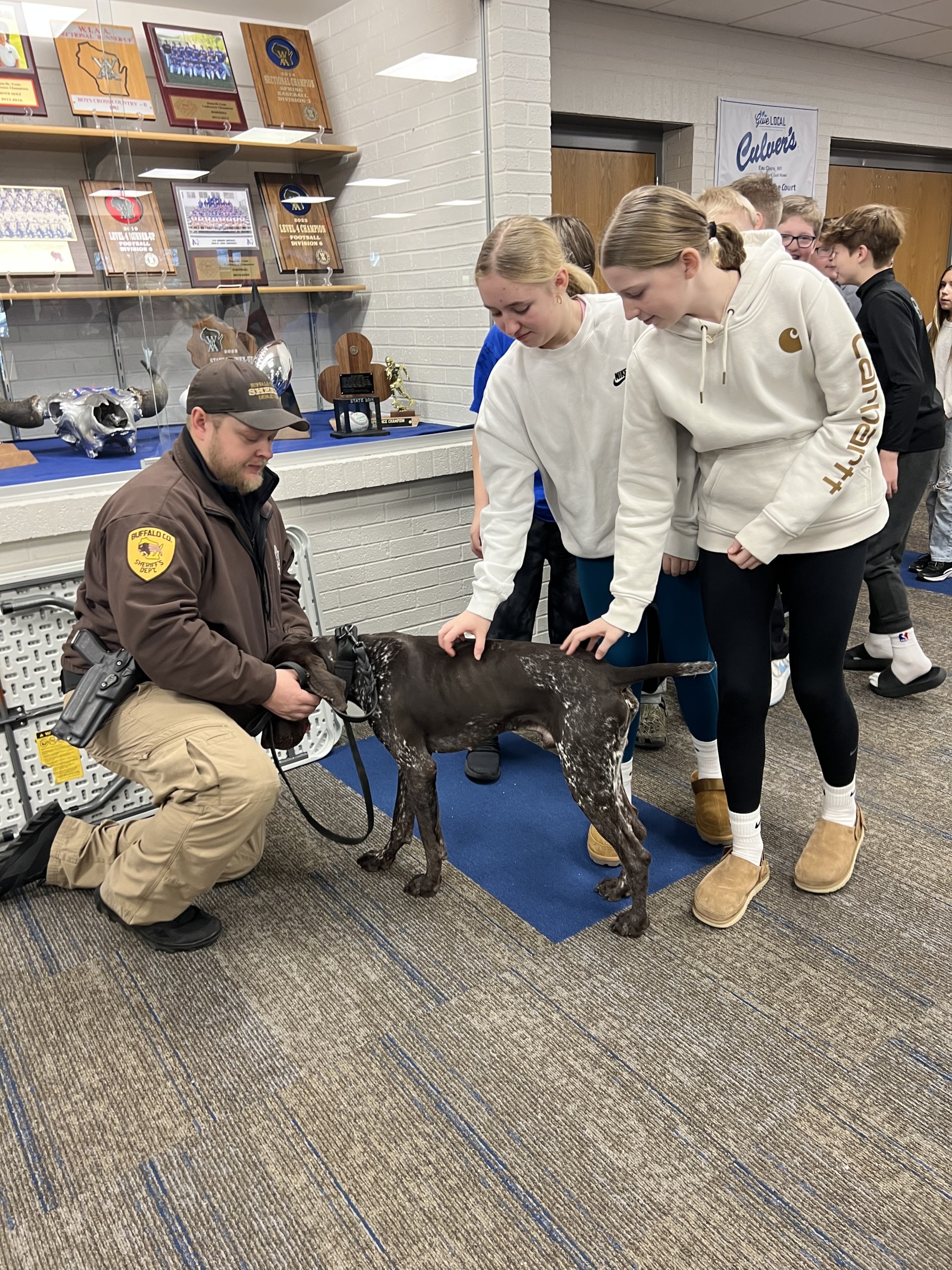 Deputy Olson with K-9 Sitka and students