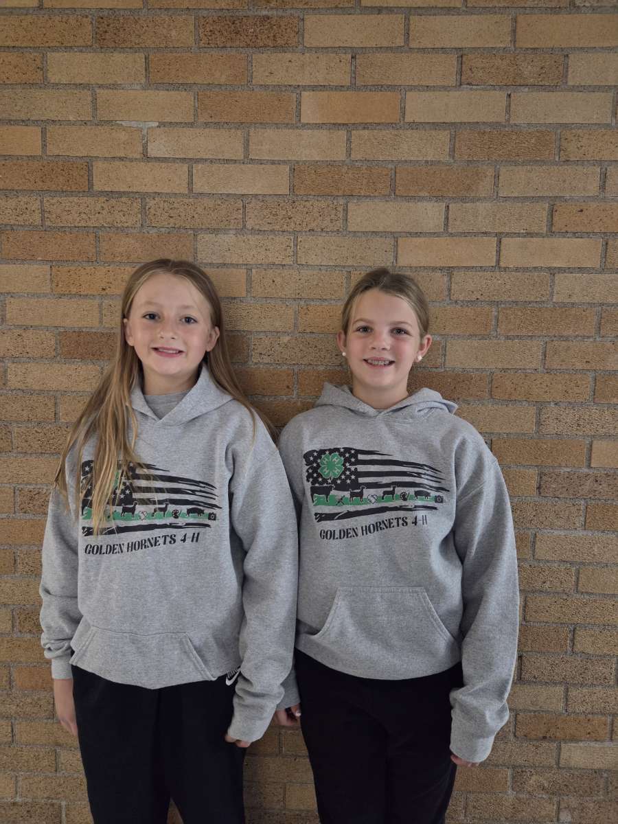 two members of the golden hornets 4-H club